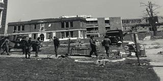 members of the national guard clean up on the campus of central state university after the 1974 tornado