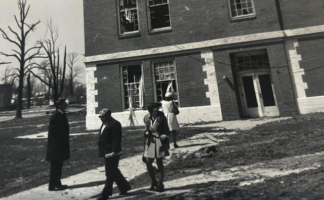 survivors of the 1974 tornado outside of a building on the central state university campus