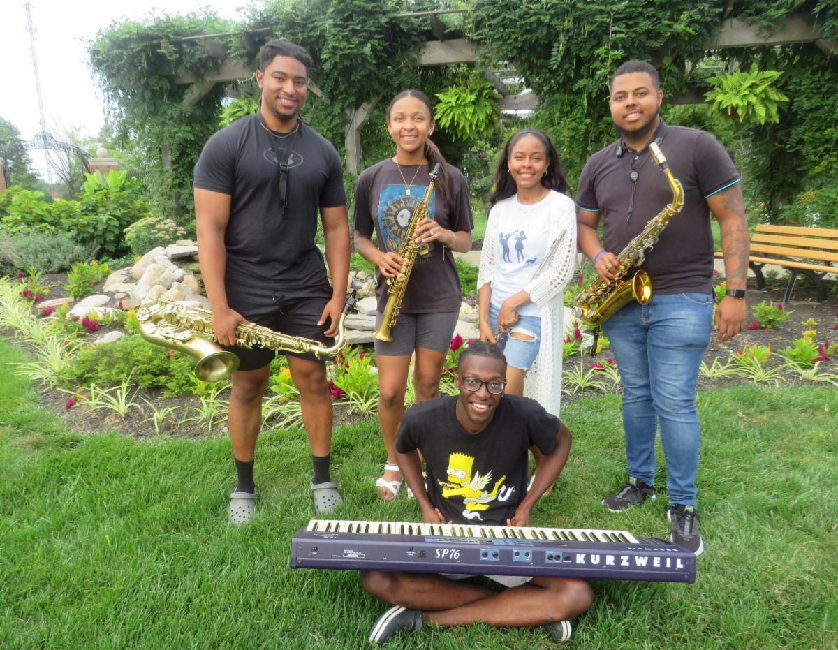 (L-r): Marvin Harshaw, junior music major, Kamille Austin, senior music major, Corey Higgs, senior music major, Kedron Rolle, senior music major (sitting); and Davaughn Major, 2023 music graduate. Photo by Dr. Cyril Ibe