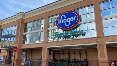 the front entrance of a Kroger building