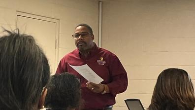 Kunta Jackson presents in front of Montgomery County Board of Developmental Disabilities advocates