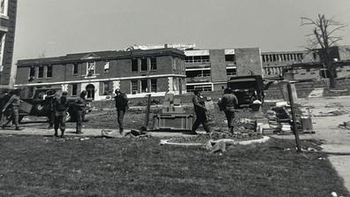 members of the national guard clean up on the campus of central state university after the 1974 tornado