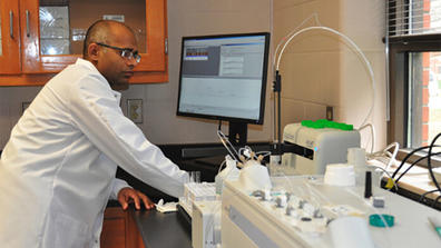 Professor Sakthi Kumaran in a research lab at central state university