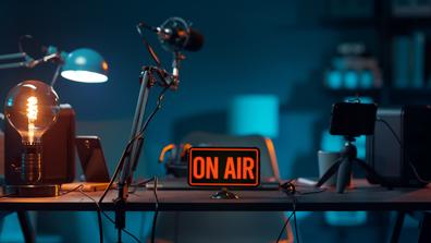 radio broadcast equipment with sign that says on air