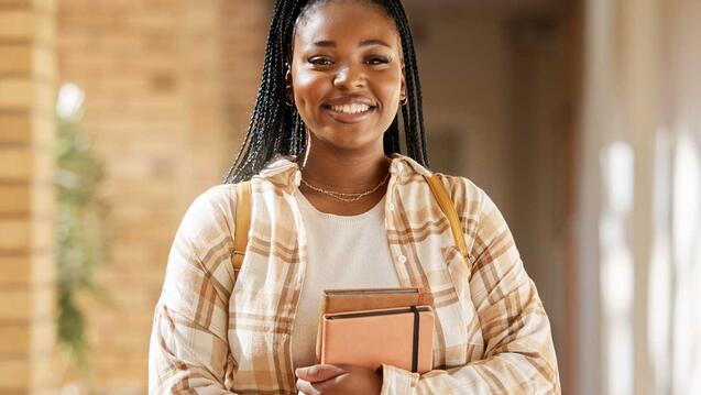 Woman holding books