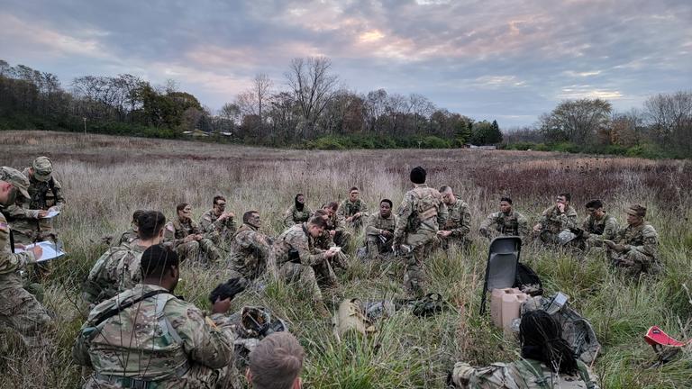 Central State University Army ROTC cadets in a field with a big open cloudy sky