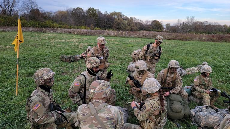 a group of cadets in an open field