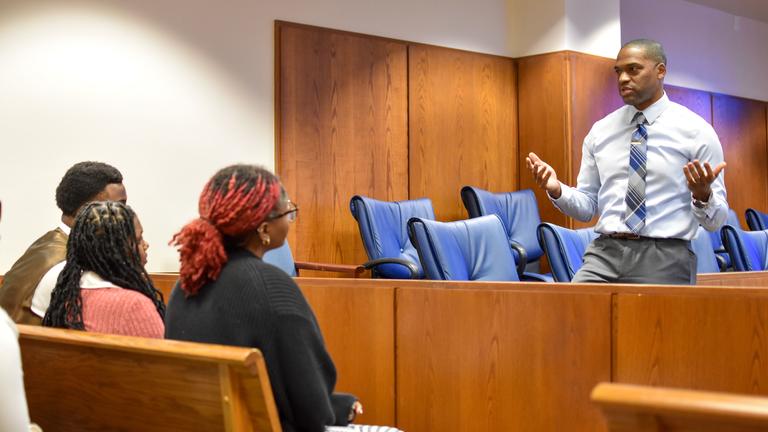 a court employee speaks to students from central state university