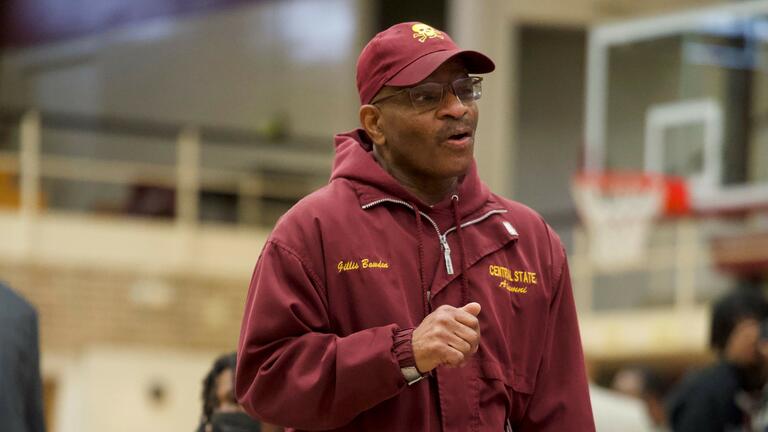 alum gillis bowden holding microphone
