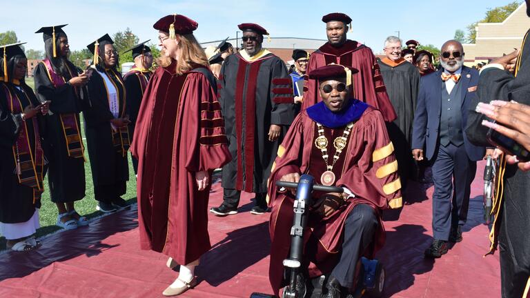 platform guests and the president of central state university