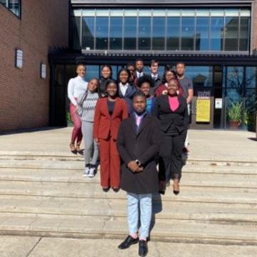 Students on the steps of the library