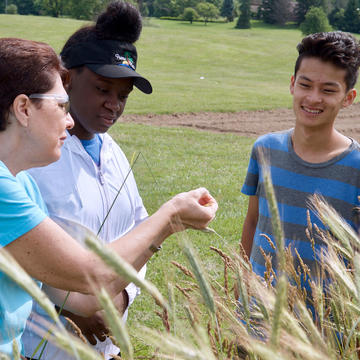 Dr Lowell with students demonstrating field crimping