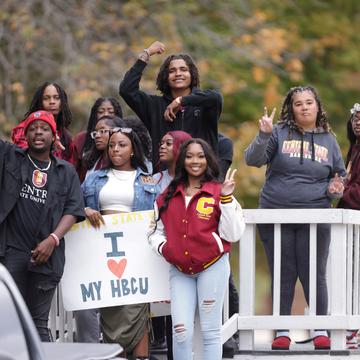 central state university students in the 2023 homecoming parade with a sign saying love my H B C U