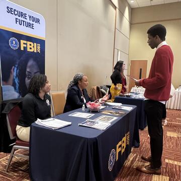 Student at Career Expo table
