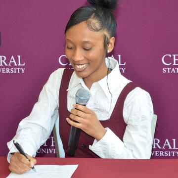 Student Signing for Career Signing Day