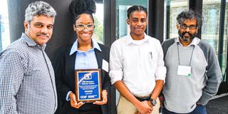 Marauders display an award from the CCAT Global Symposium for their project on self-driving cars