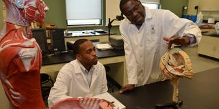 a student and professor in an anatomy lab at Central State University