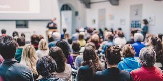 a large group of people attend a University-sponsored event