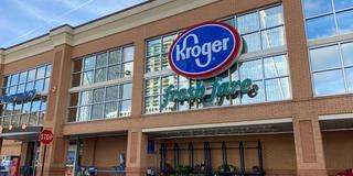 the front entrance of a Kroger building
