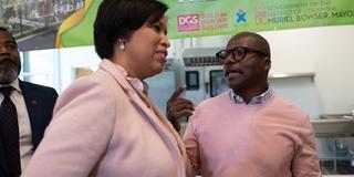 Bryan Scottie Irving and Mayor Muriel Bowser at the grand opening of a Blue Skye Construction project The Aya in 2020