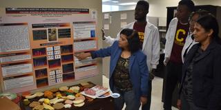 Central State University research associate professor of food, nutrition and health Pratibha Gupta, Ph.D., in her lab with student researchers