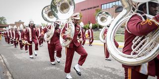 tuba section of the invincible marching marauders on the campus of central state university
