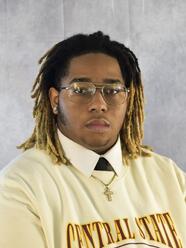 Denzel McCoy, an intern with Nationwide, is pictured in a Central State University sweater with "Central State" visible