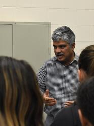Dr. Krishna Kumar Nedunuri speaks to fifth graders about water resources management
