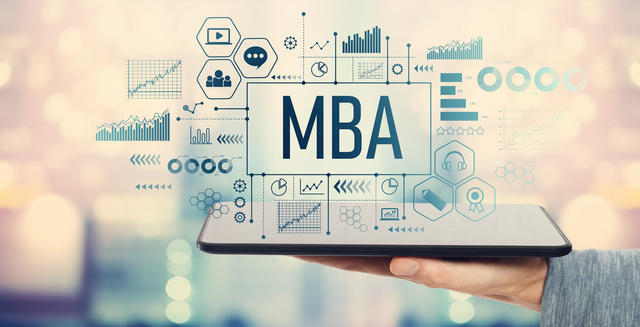 MBA Online-hand holding a tablet with digital MBA floating above it