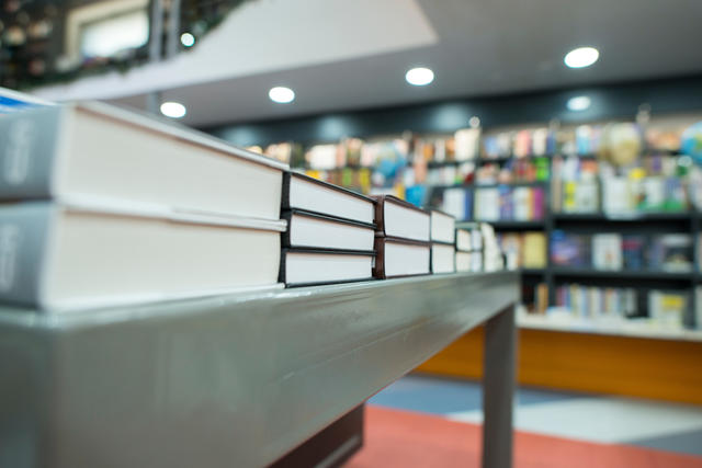 Textbooks on a table in a bookstore