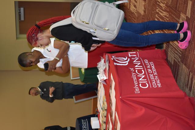central state university students at a university of cincinnati medical school information table