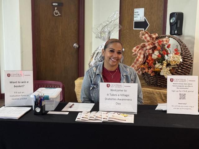 Kylee Peoples at an nformation table