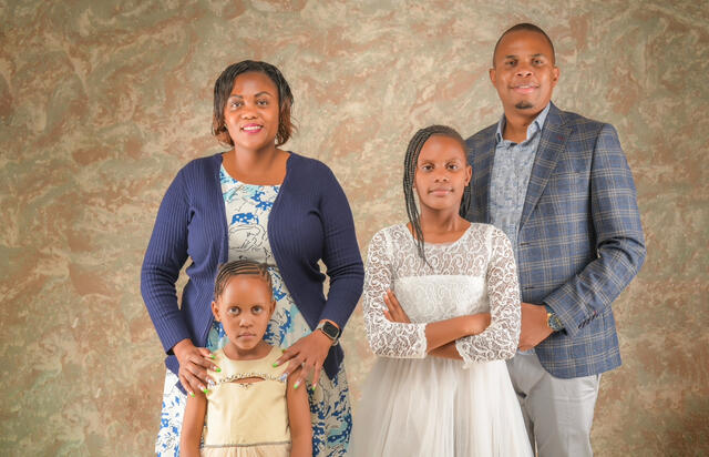 eunice kang'ethe with her husband and two daughters