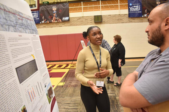Heaven Strachan presents research at central state university