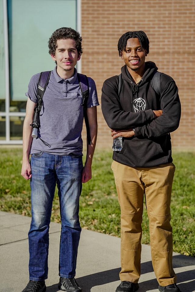 Tristin Fernandes and Aisayah Akens wearing backpacks