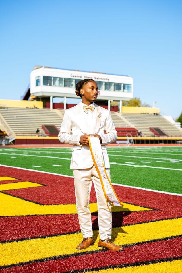 nasaan jackson dressed for royal court standing on the marauder athletics football field mcpherson stadium