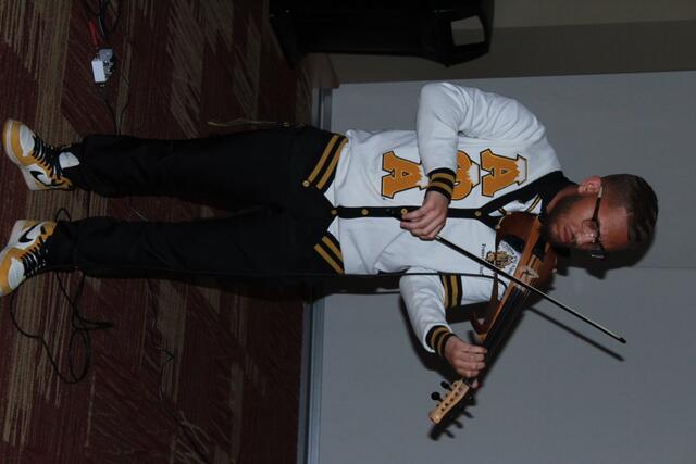 Pablo playing the Violin during a CSU event